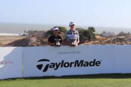 Junior Aspirations at The Bluffs Champions posing behind TaylorMade Signage, Premier Partner of the JGTA